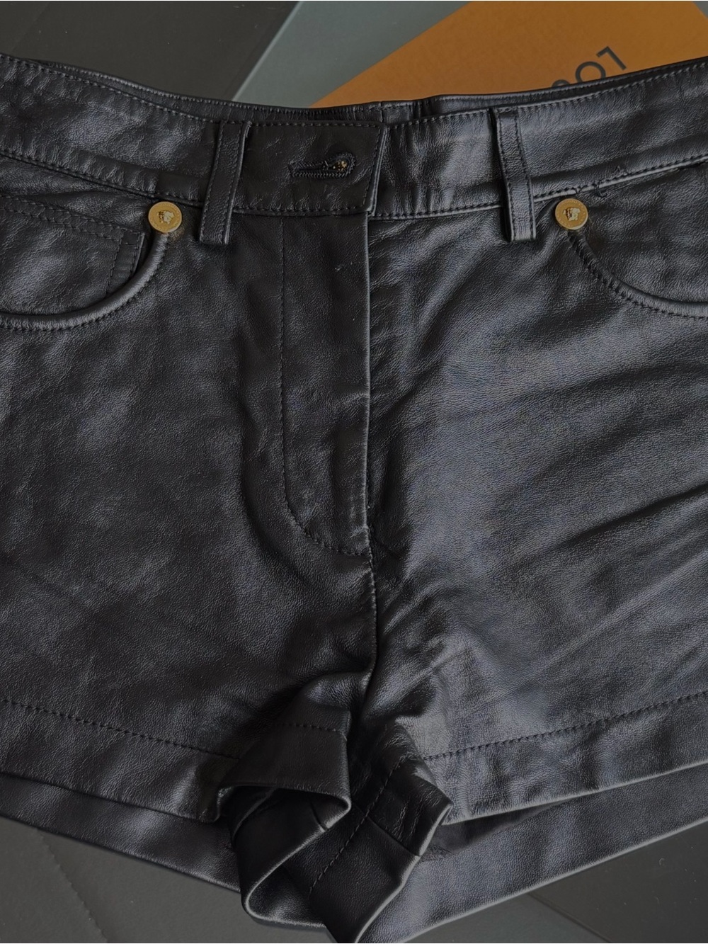 Authentic Versace Black Leather-Look Women’s Jean Shorts with Gold Buttons